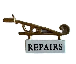 Pointy Toed Showmaker Repairs Sign